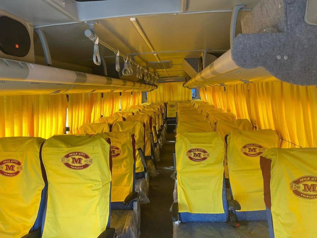 28 Seater Bus for hire in Hyderabad by Mega City Tours and Travells.